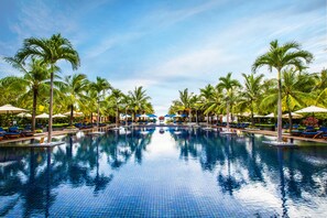 Outdoor pool, pool umbrellas, pool loungers