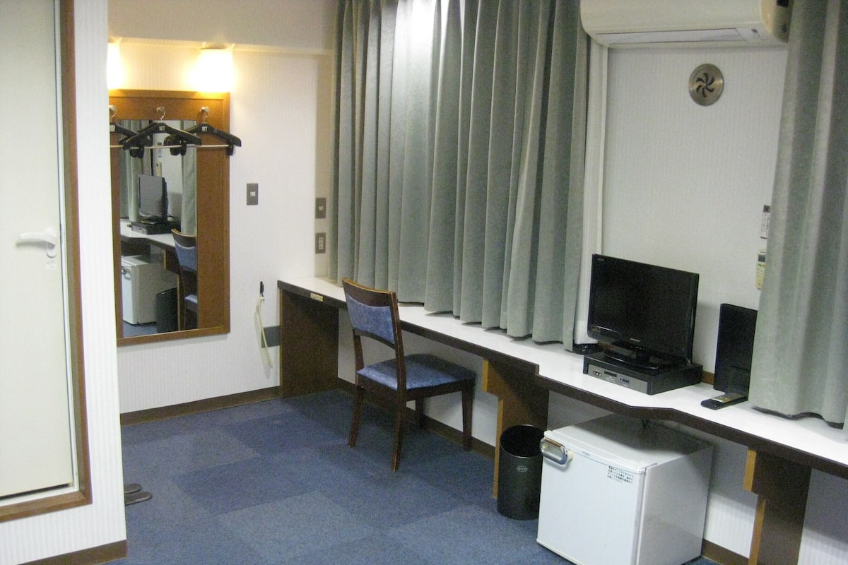 Down duvets, desk, blackout curtains, iron/ironing board