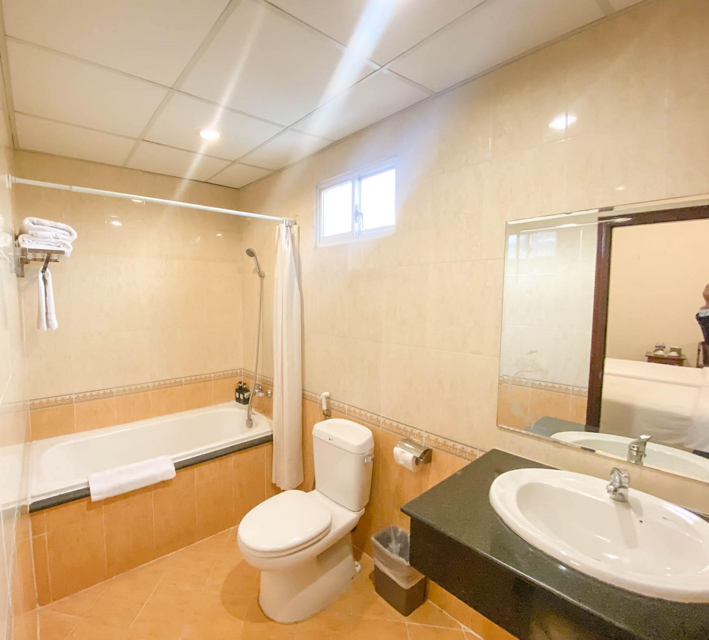 superior twin room (without window) | bathroom | free toiletries, hair dryer, bathrobes, slippers