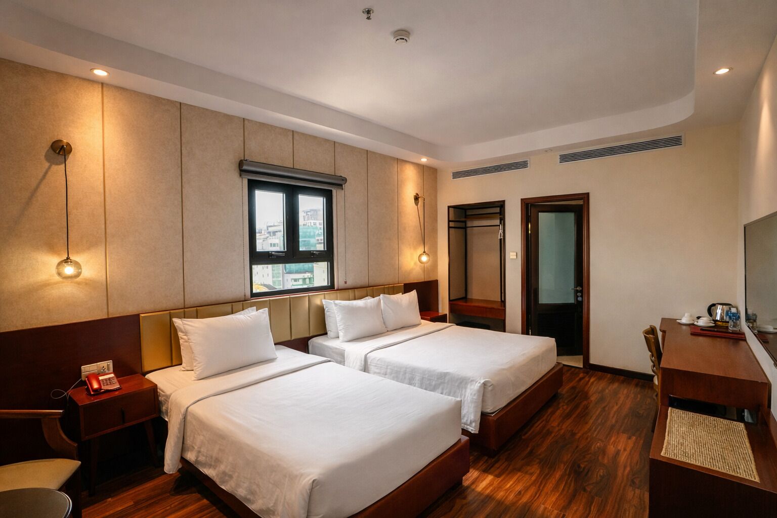 Deluxe Triple Room (Window) | Minibar, in-room safe, free WiFi, bed sheets