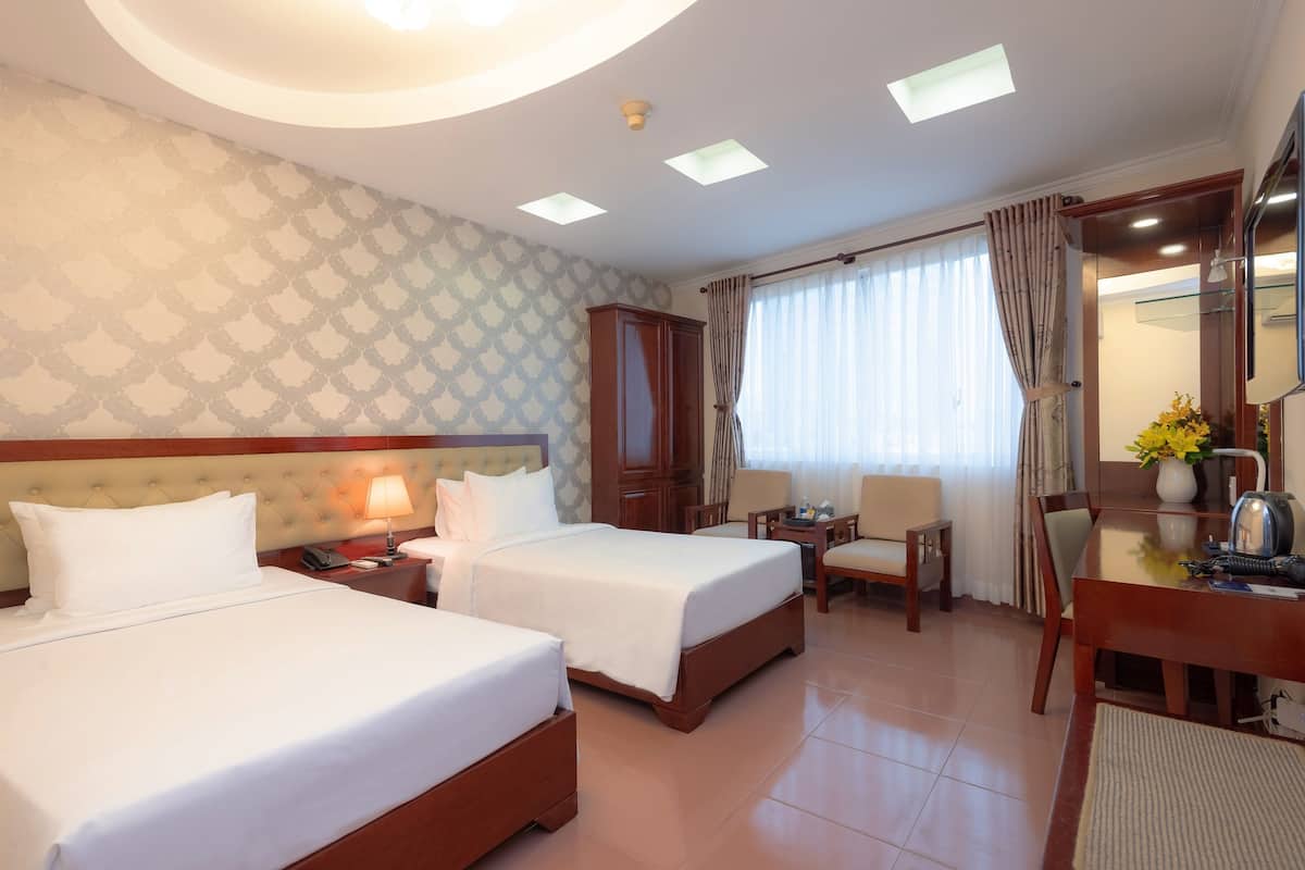 Deluxe Twin kamer (Window) | Een minibar, een kluis op de kamer, gratis wifi, beddengoed