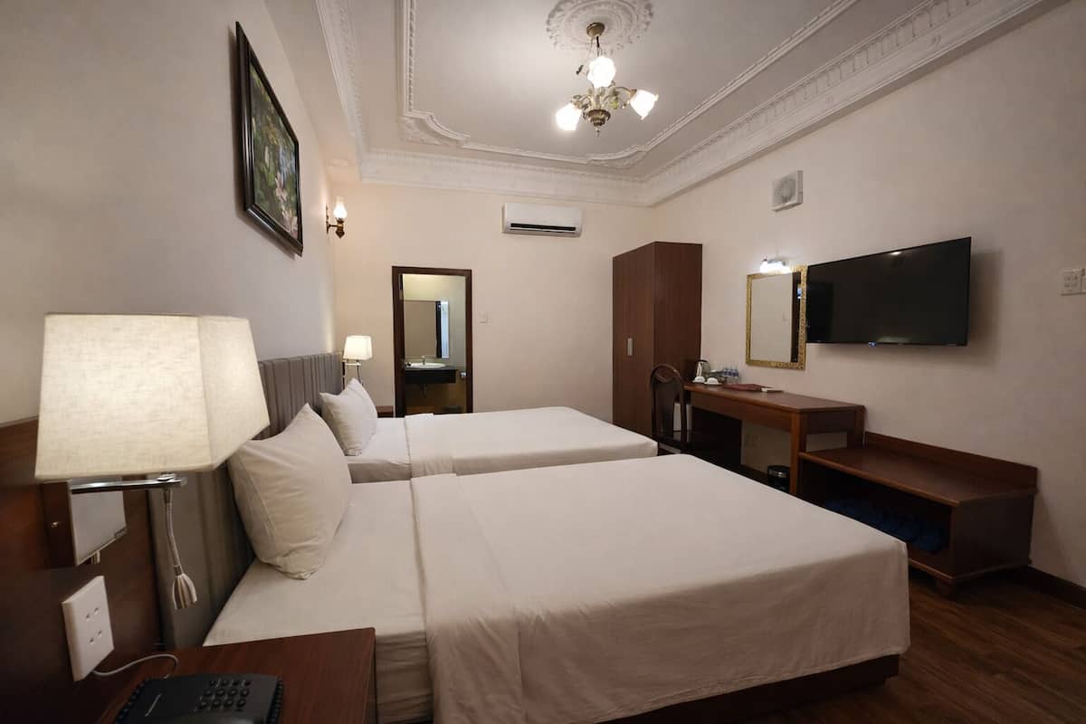 Superior driepersoonskamer (No Window) | Een minibar, een kluis op de kamer, gratis wifi, beddengoed