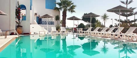 Outdoor pool, pool umbrellas, pool loungers