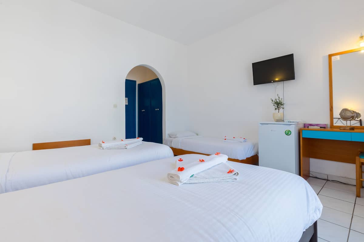 triple room | in-room safe, iron/ironing board, free cots/infant beds, rollaway beds