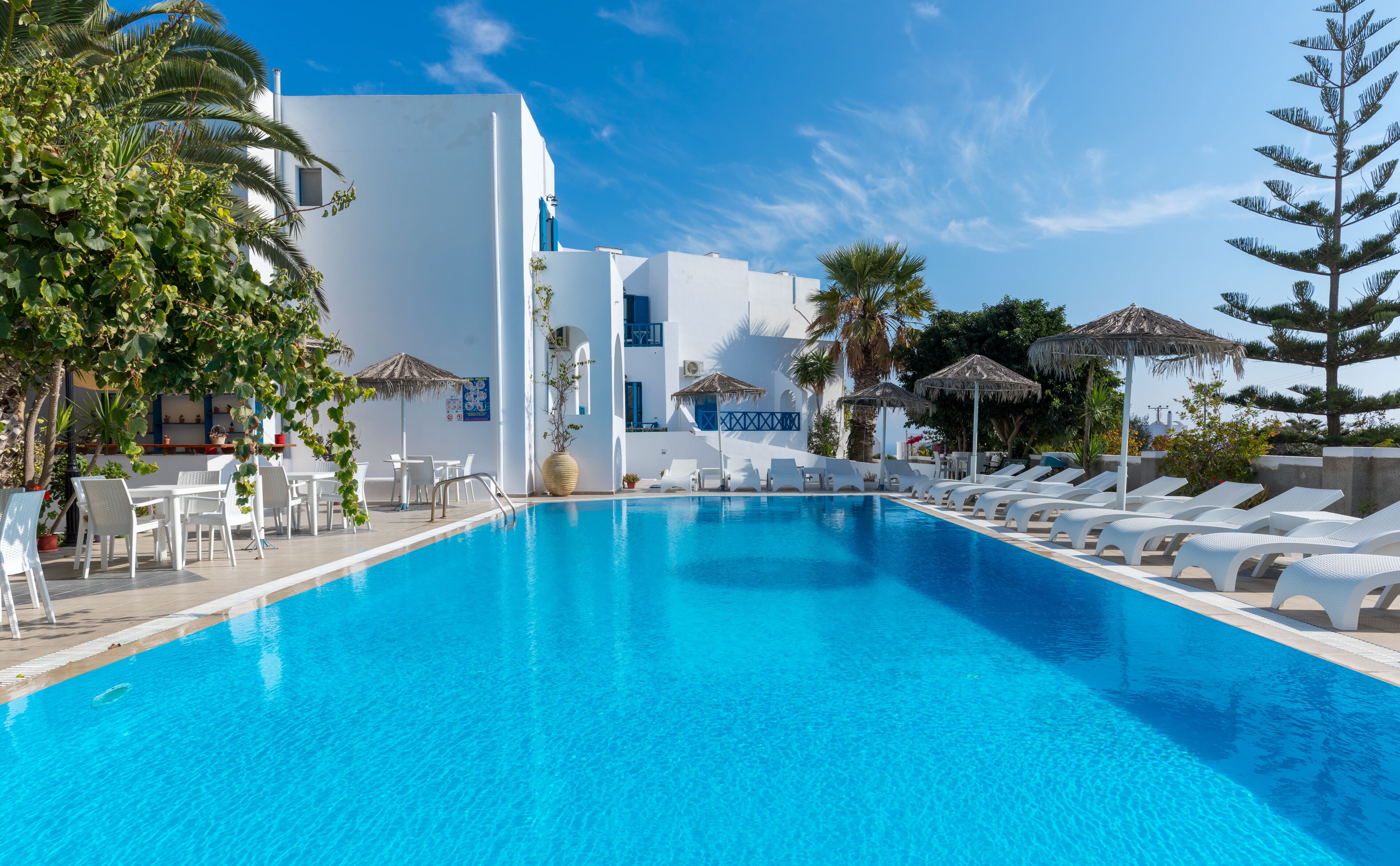 outdoor pool, pool umbrellas, pool loungers