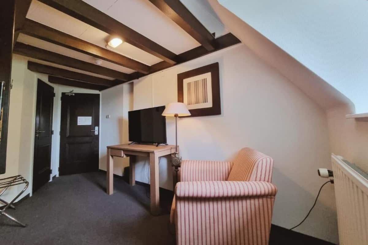 Chambre de base double | Aire de sĂ©jour | TĂ©lĂ©viseur, station dâaccueil pour iPod