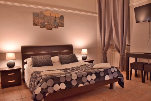 Quadruple Room, Private Bathroom | In-room safe, desk, iron/ironing board, free WiFi