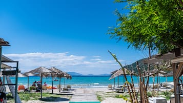 On the beach, free beach cabanas, sun loungers, beach umbrellas