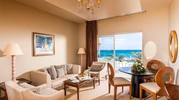 Prestige Suite | Living area | Flat-screen TV