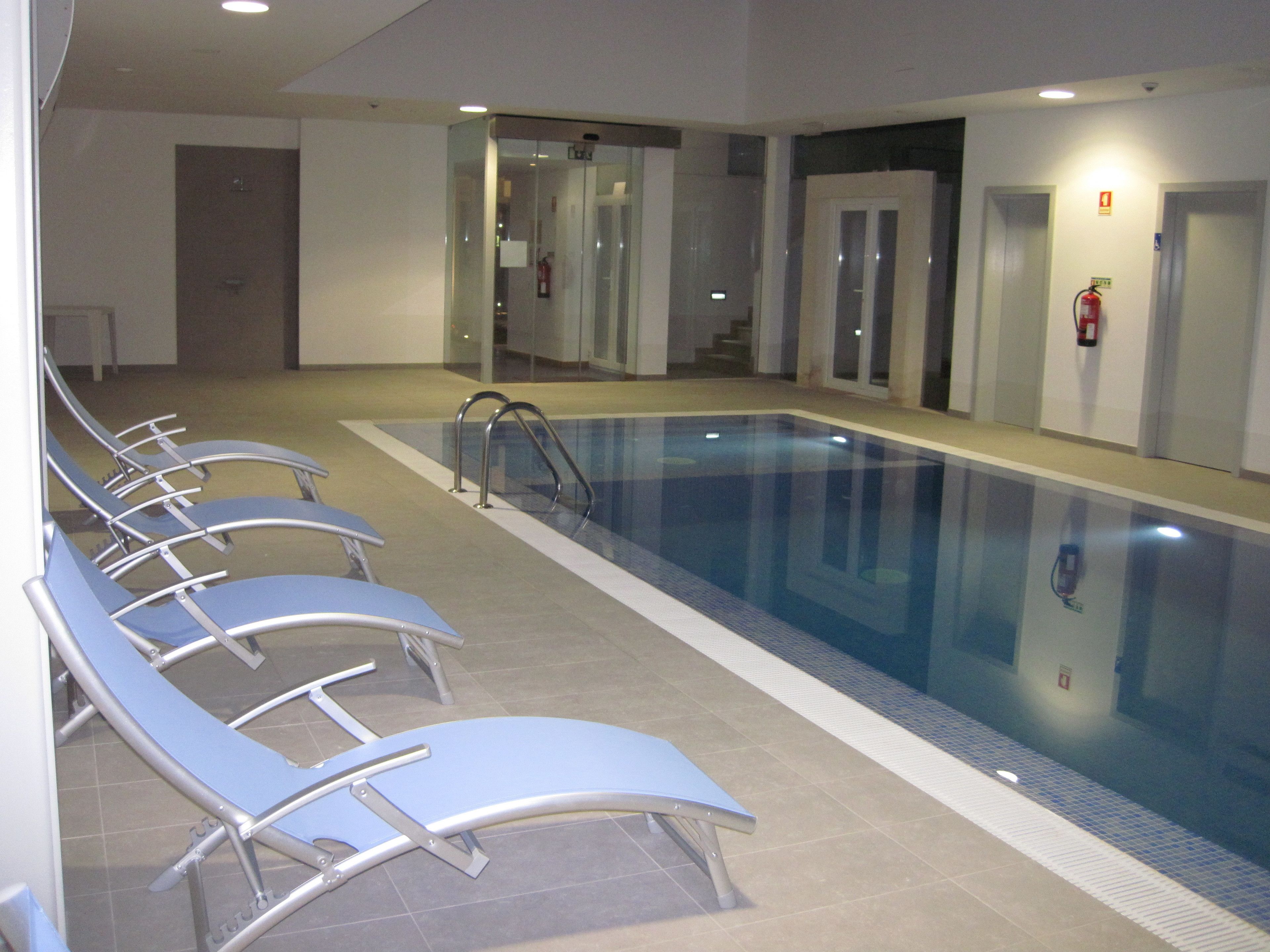 indoor pool, pool loungers
