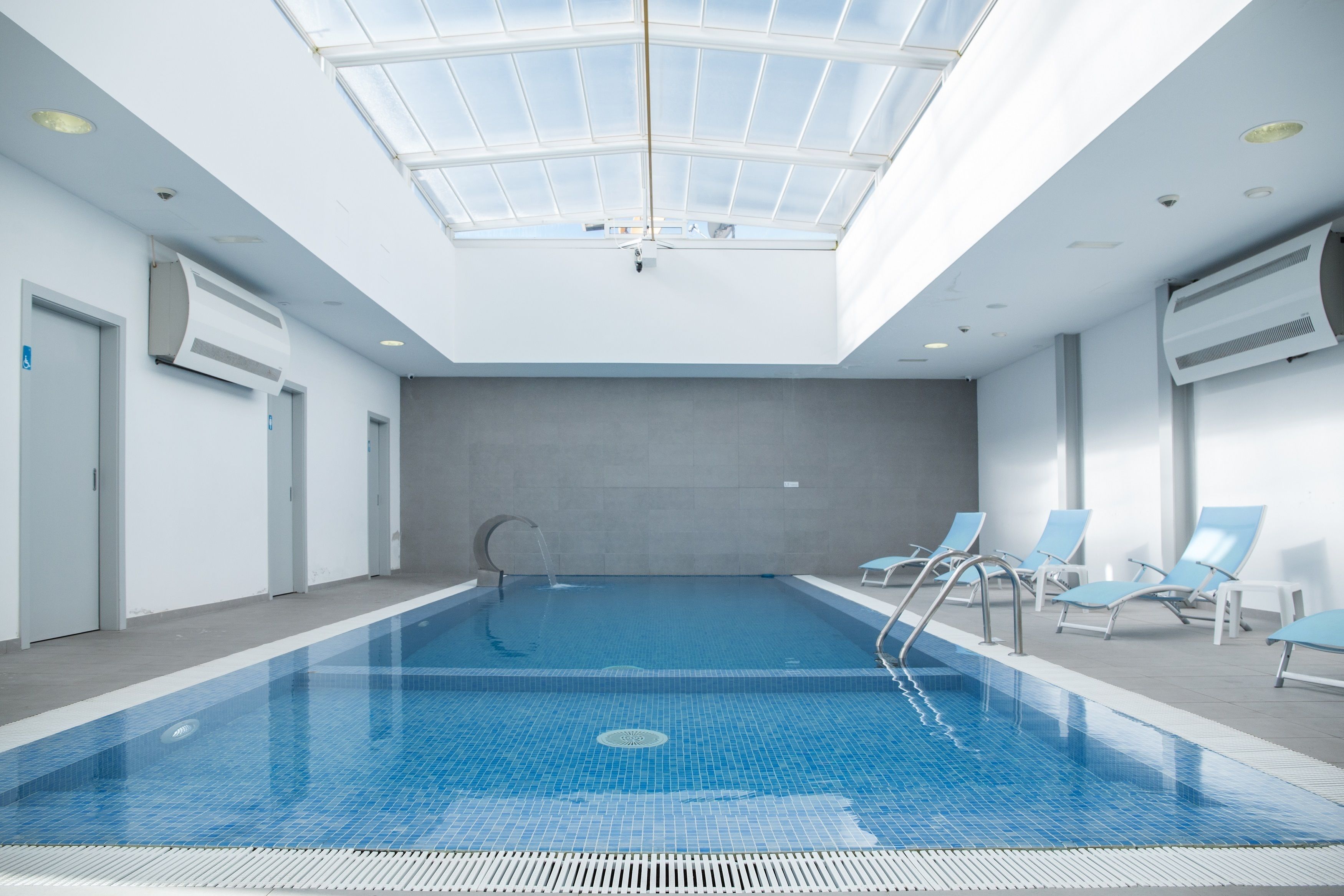 indoor pool, pool loungers