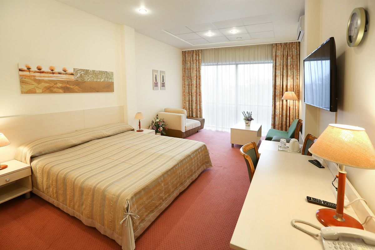 desk, blackout curtains, iron/ironing board, free wifi