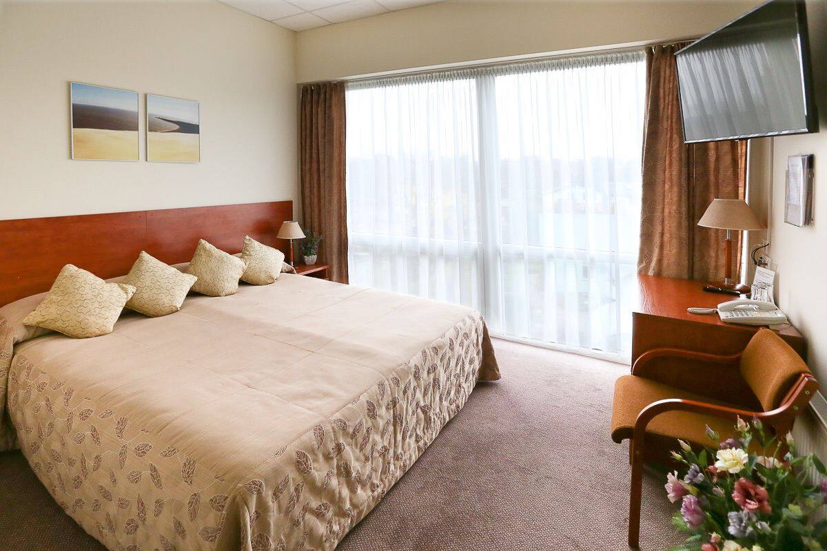 desk, blackout curtains, iron/ironing board, free wifi