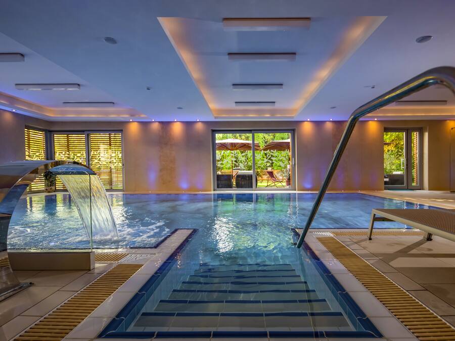 2 indoor pools, open 7:00 AM to 8:00 PM, pool loungers