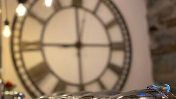 A close-up of a metallic, reflective object with a circular design, possibly a decorative piece or part of a larger structure.