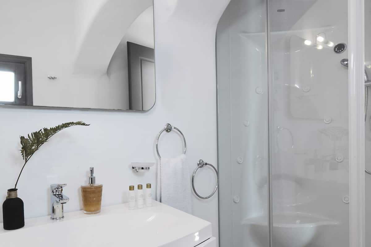 serenity villa with caldera view, heated pool & hot tub in private garden | bathroom | shower, hydromassage showerhead, designer toiletries, hair dryer