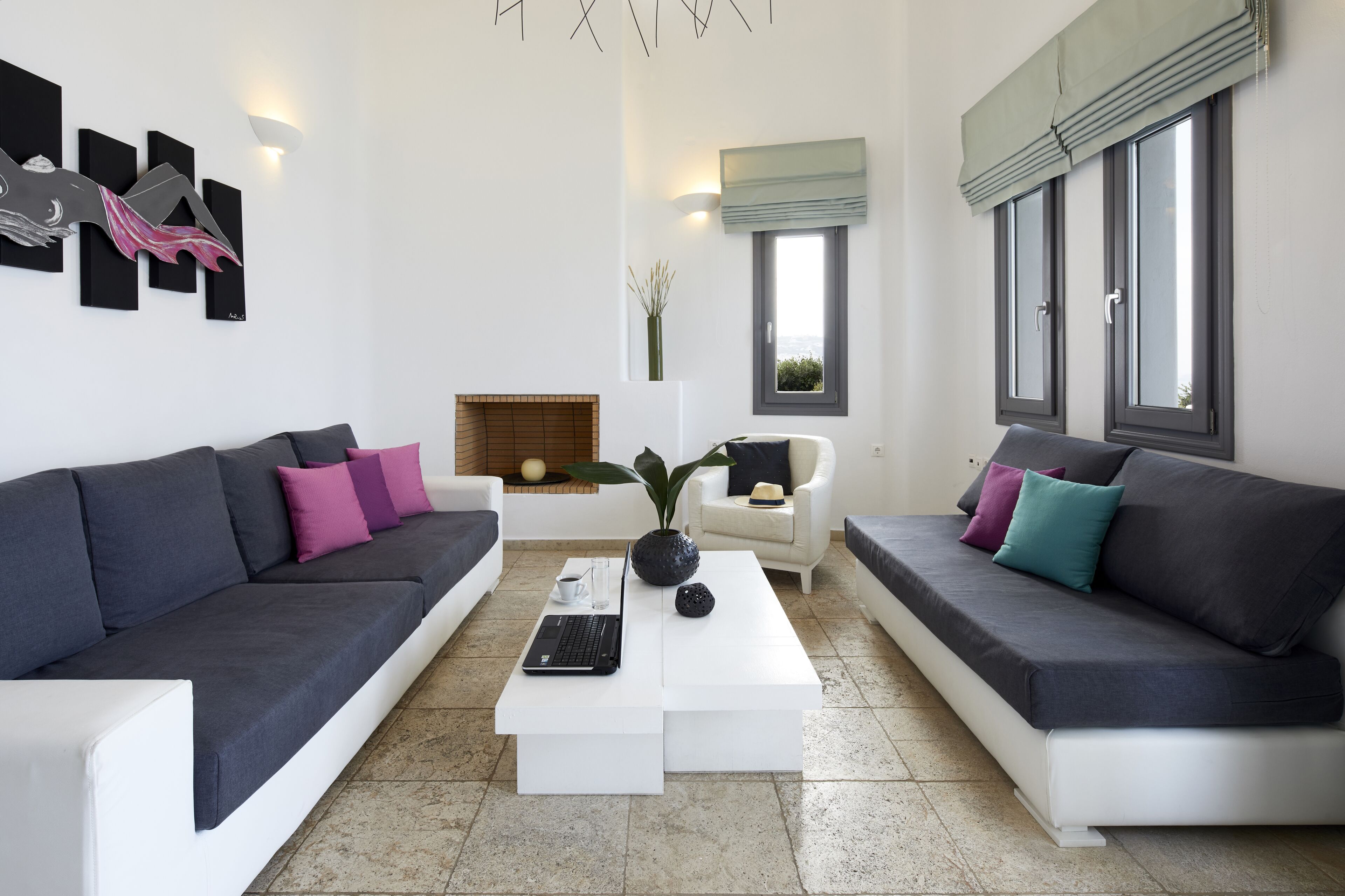 serenity villa with caldera view, heated pool & hot tub in private garden | living area | 32-inch tv with satellite channels, fireplace, dvd player