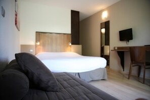 Desk, blackout curtains, free WiFi, bed sheets