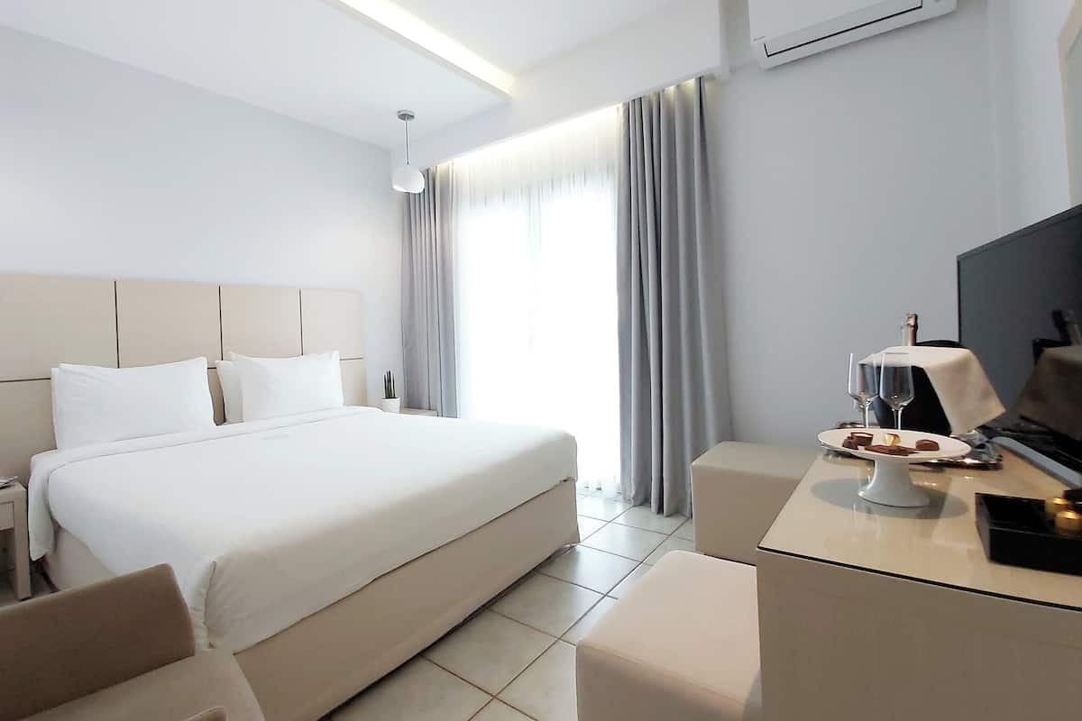 Chambre Double Supérieure | Literie hypoallergénique, couette en duvet d'oie, matelas Tempur-Pedic