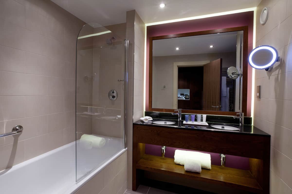 combined shower/bathtub, free toiletries, hair dryer, bathrobes