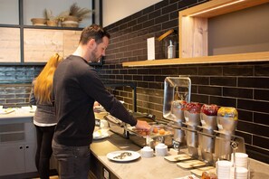 Daily buffet breakfast (EUR 18 per person)