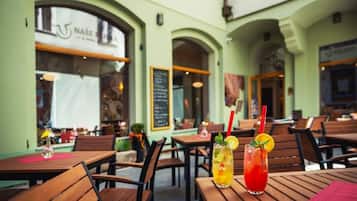 Breakfast, lunch, dinner served; local cuisine