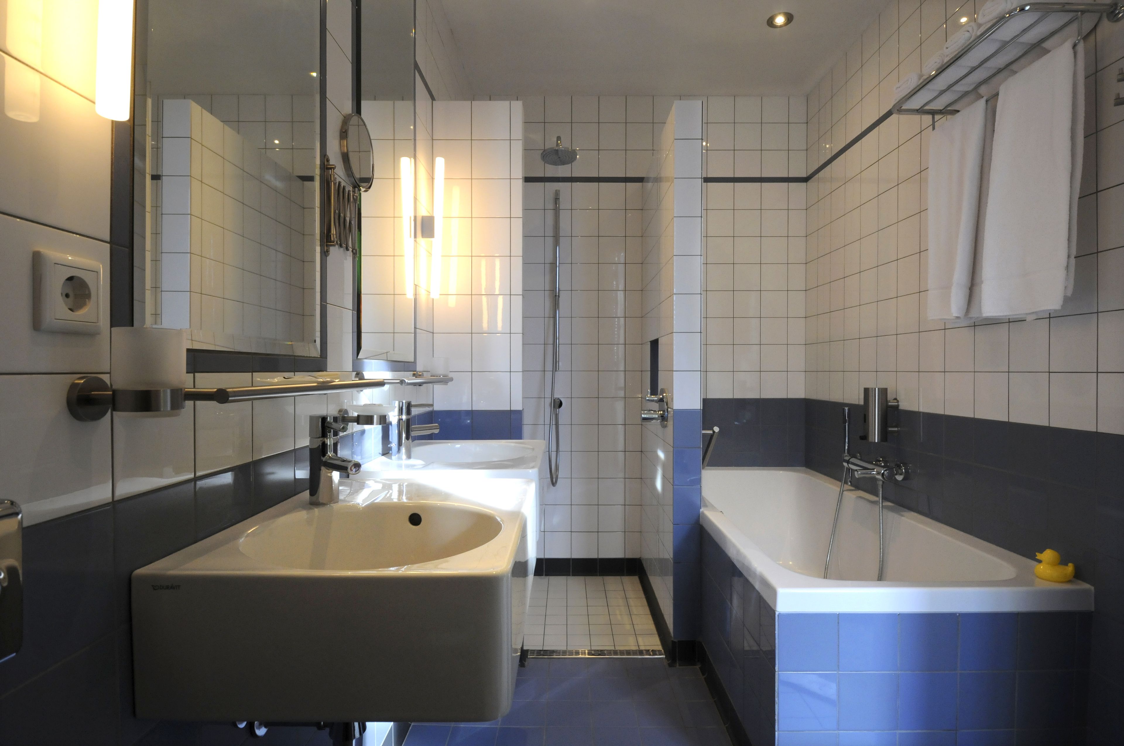 double room, bathtub, tower | bathroom | rainfall showerhead, hair dryer, towels