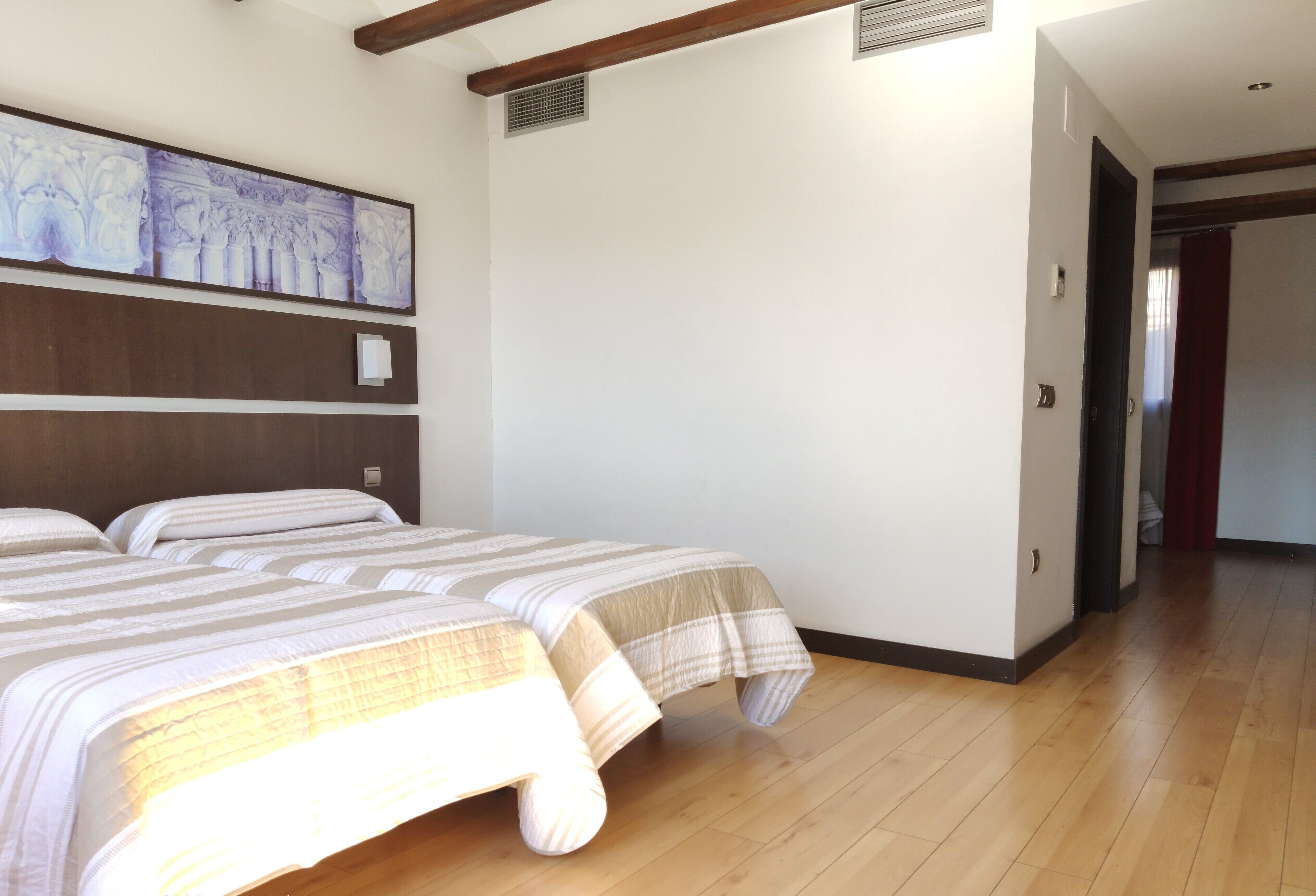 quadruple room | in-room safe, desk, laptop workspace, blackout curtains