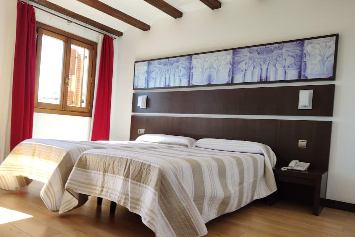 quadruple room | in-room safe, desk, laptop workspace, blackout curtains