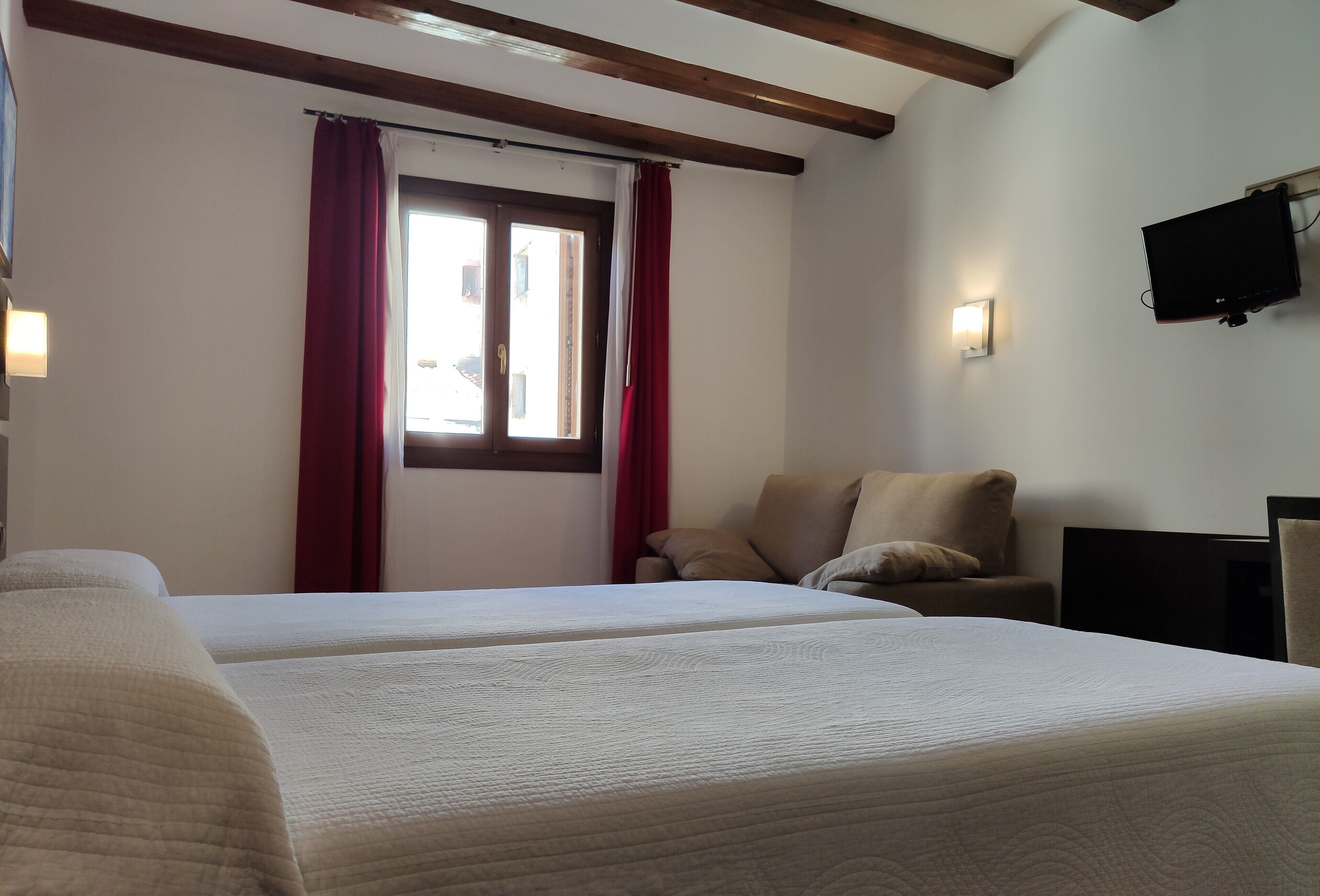 triple room | in-room safe, desk, laptop workspace, blackout curtains