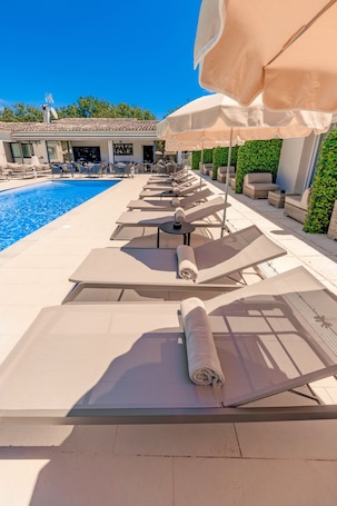 Outdoor pool, open 10:00 AM to 8:00 PM, pool umbrellas, sun loungers
