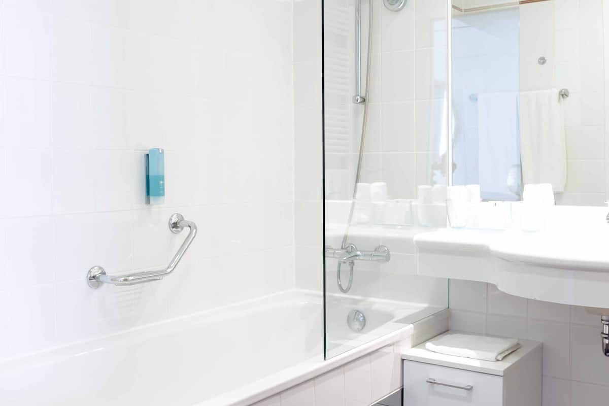 hair dryer, bathrobes, slippers, towels