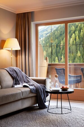 Premium Suite, 1 Bedroom, Balcony | Living area | Flat-screen TV, toys, first-run movies - Adler Inn Tyrol Mountain Resort SUPERIOR (Tux)