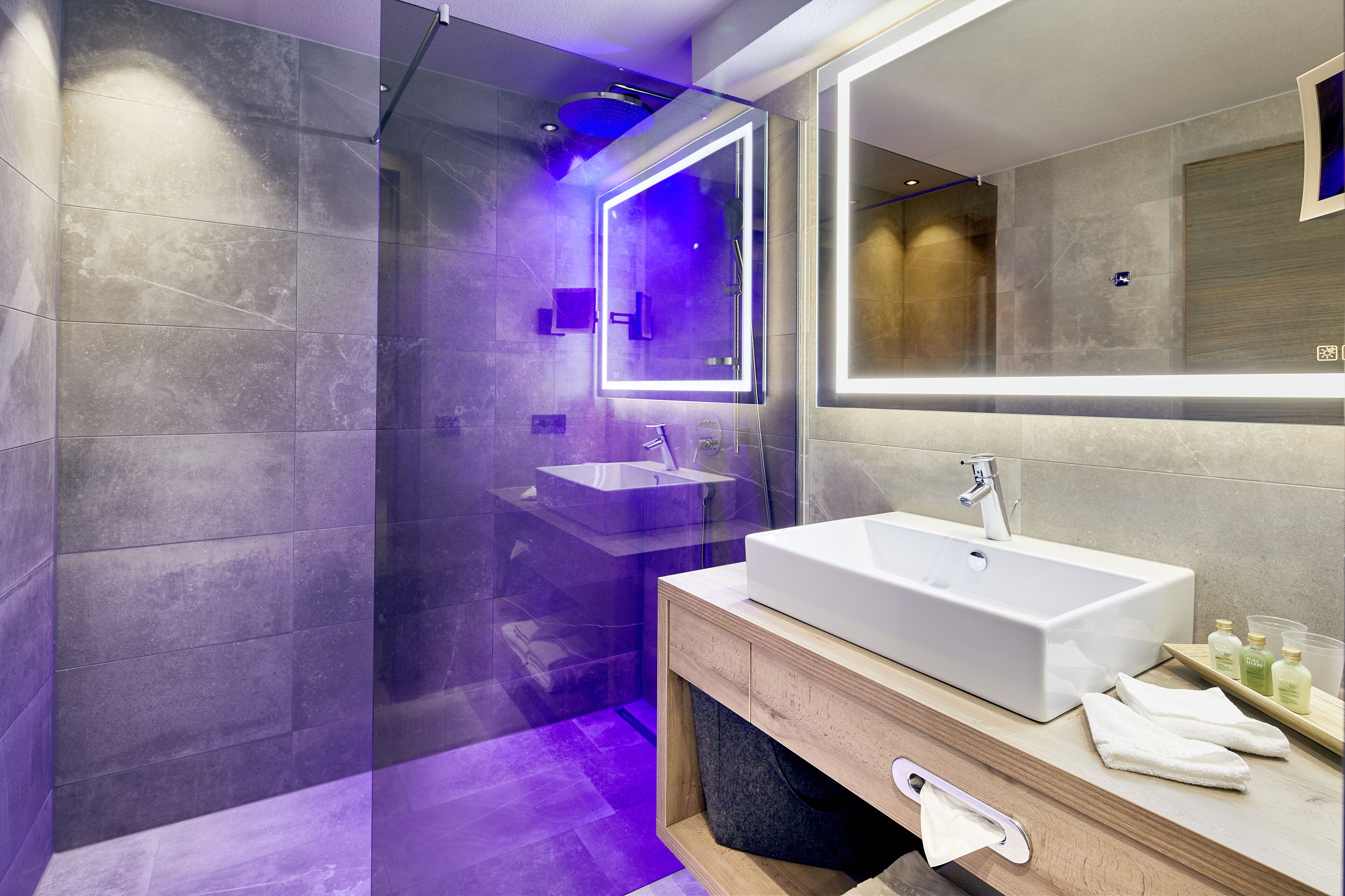 eco-friendly toiletries, hair dryer, bathrobes, slippers