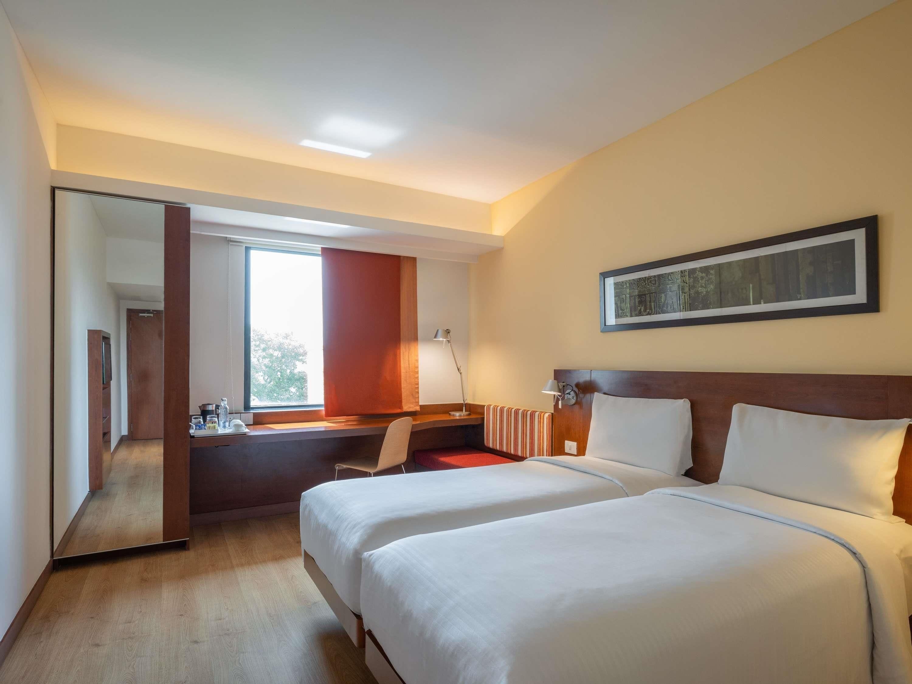 Memory-foam beds, minibar, in-room safe, desk