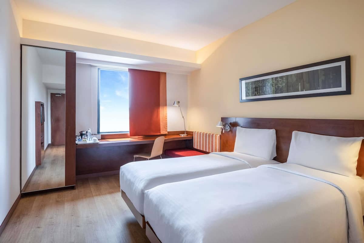 Memory foam beds, minibar, in-room safe, desk