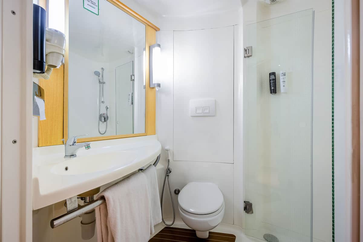 Shower, rainfall showerhead, eco-friendly toiletries, hair dryer