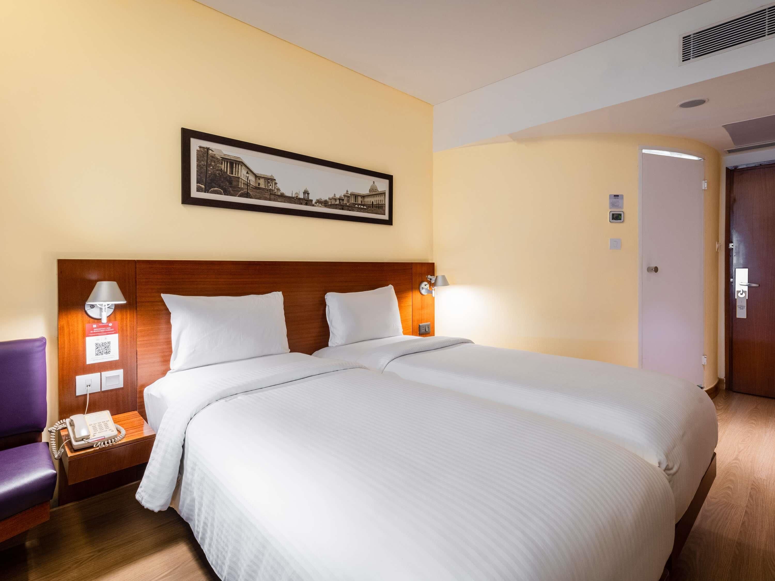 Memory foam beds, minibar, in-room safe, desk