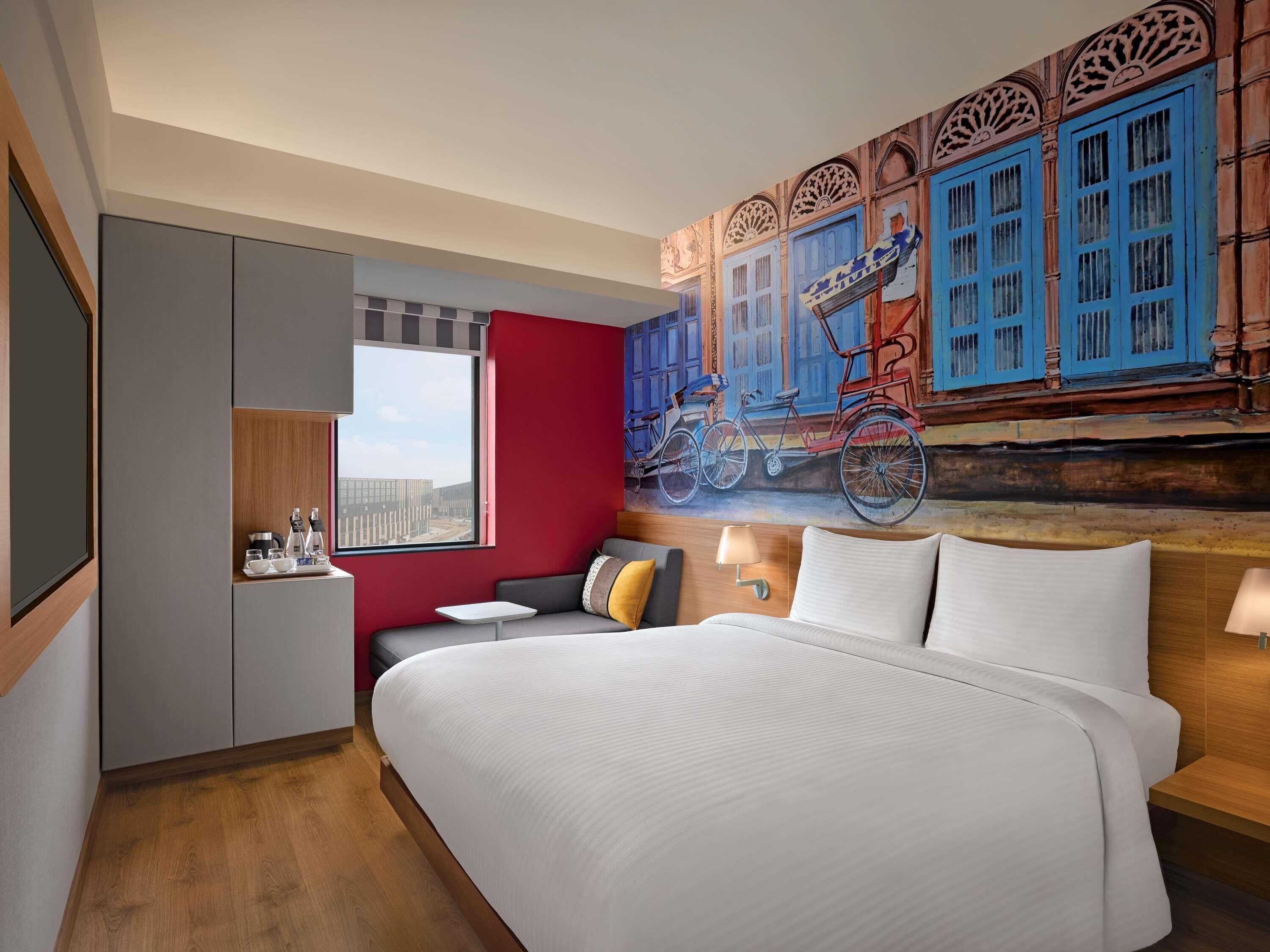 Memory-foam beds, minibar, in-room safe, desk