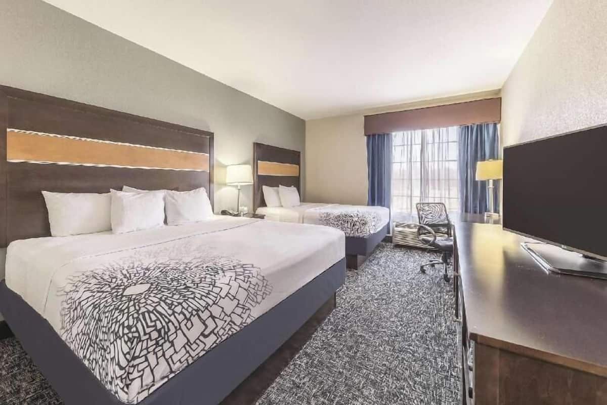 Premium bedding, pillowtop beds, desk, blackout drapes