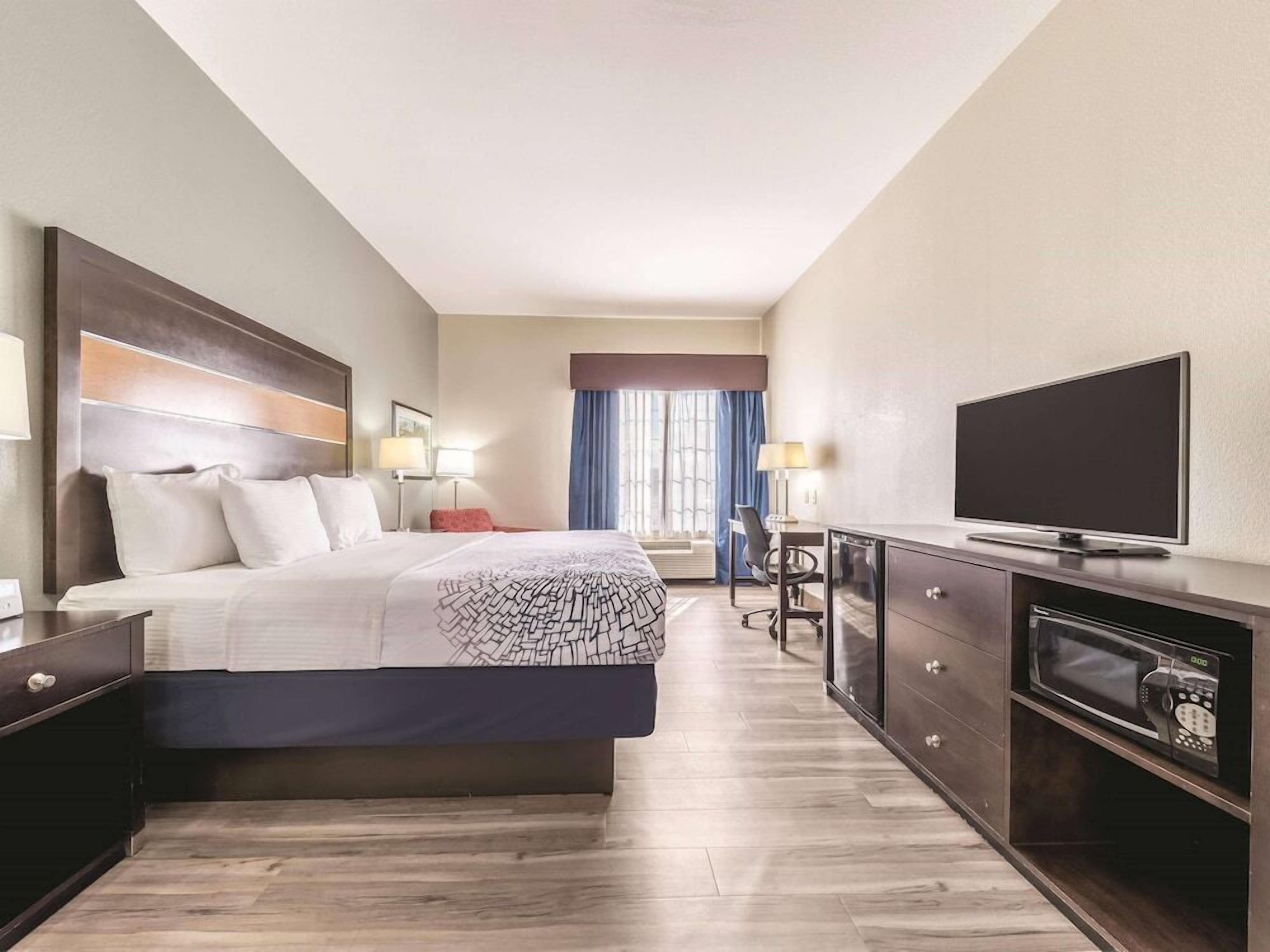 Premium bedding, pillowtop beds, desk, blackout drapes