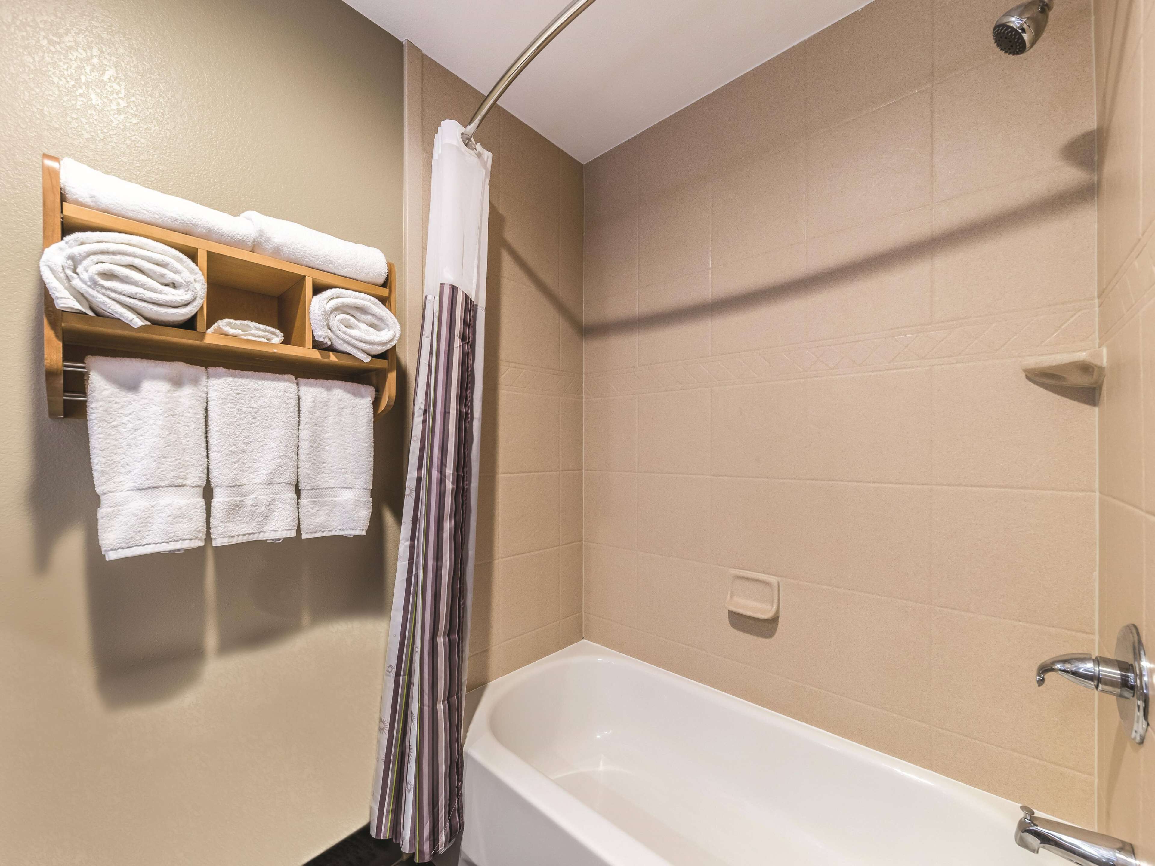 deluxe room, 1 king bed, non smoking | premium bedding, pillow-top beds, desk, blackout curtains