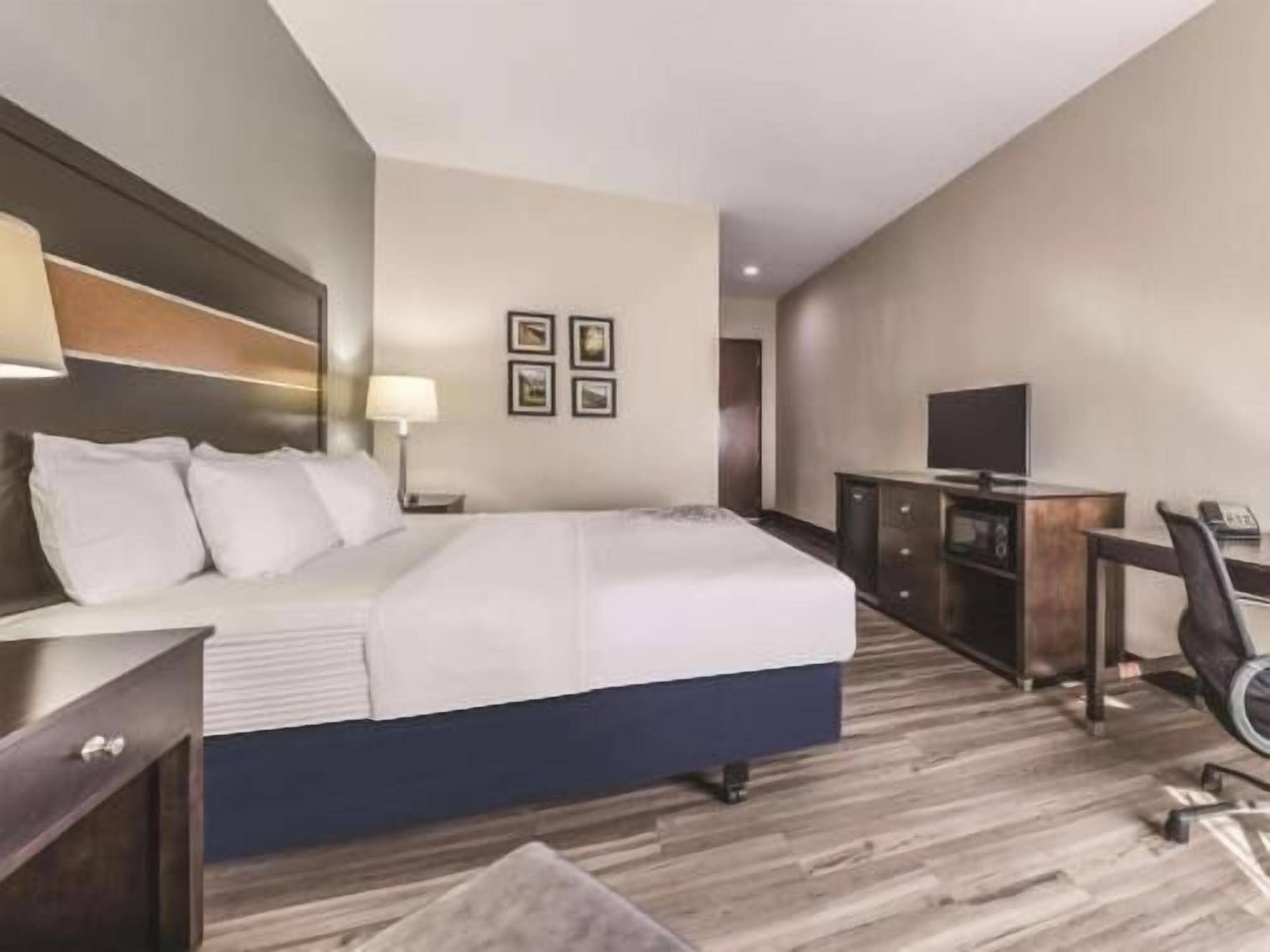 Premium bedding, pillowtop beds, desk, blackout drapes