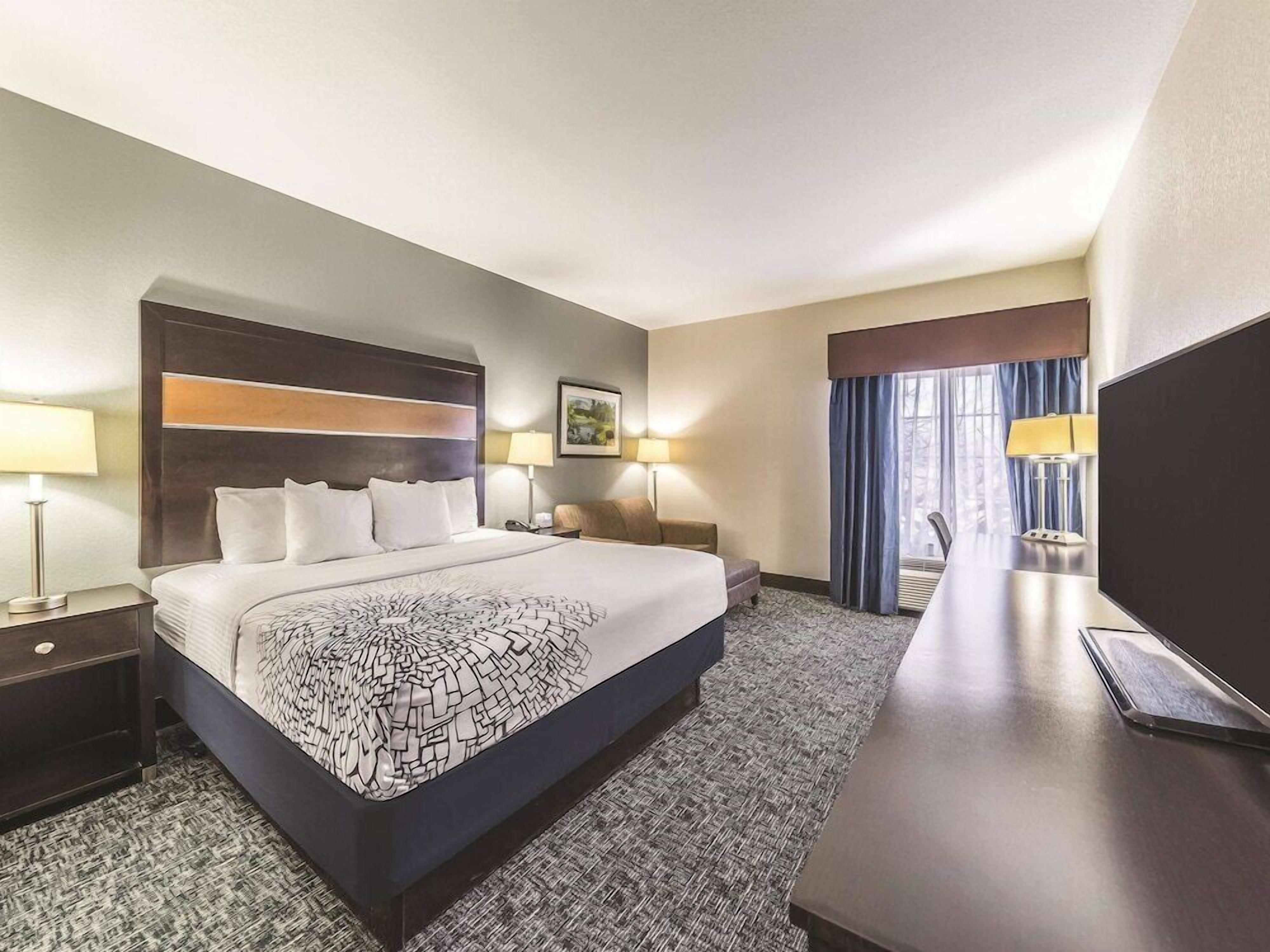 Premium bedding, pillowtop beds, desk, blackout drapes