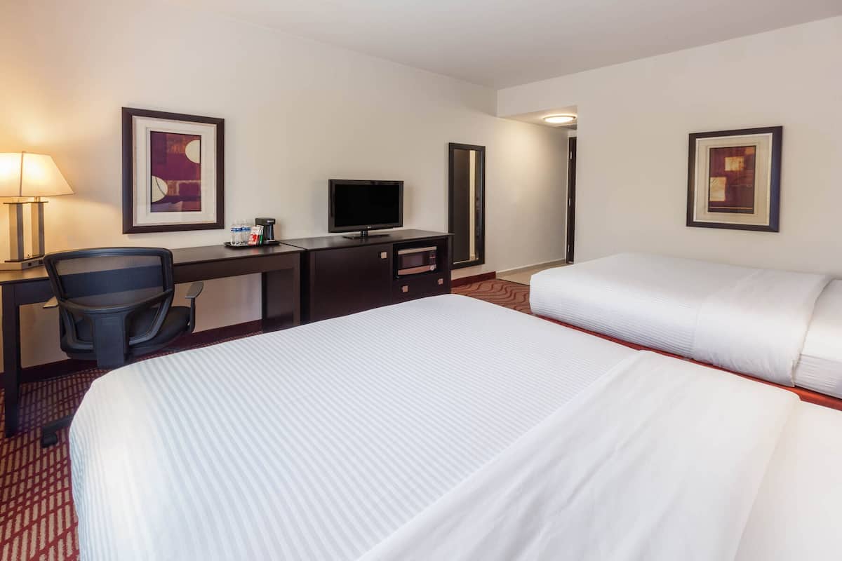 room, 2 queen beds, non smoking, city view | premium bedding, down duvets, in-room safe, desk