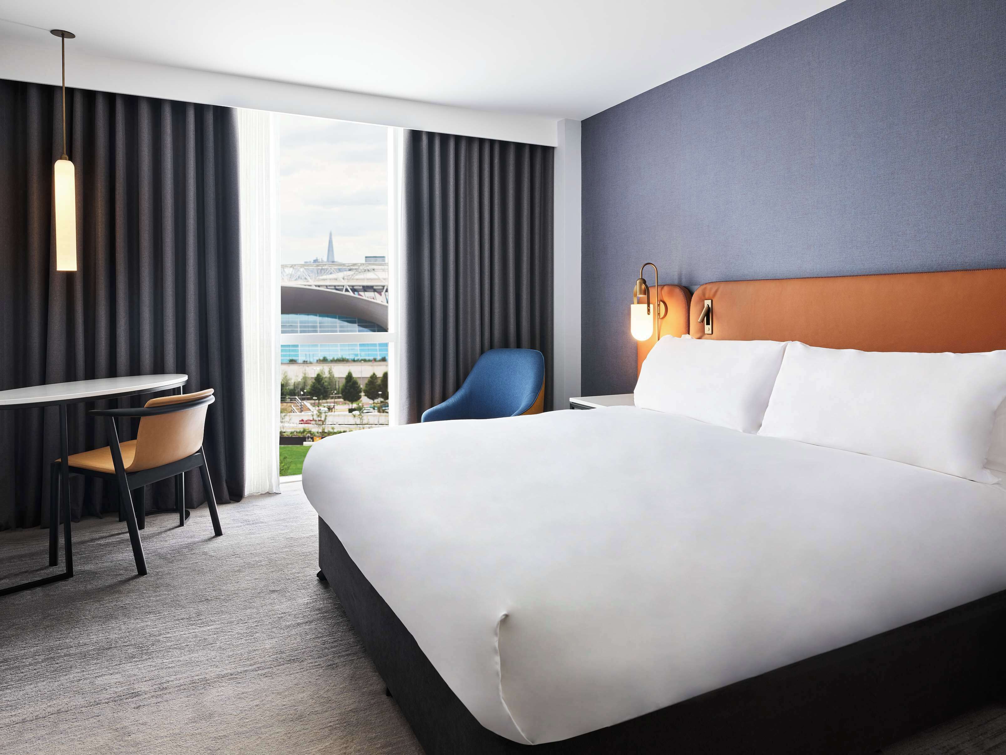 Hypo-allergenic bedding, in-room safe, desk, laptop workspace