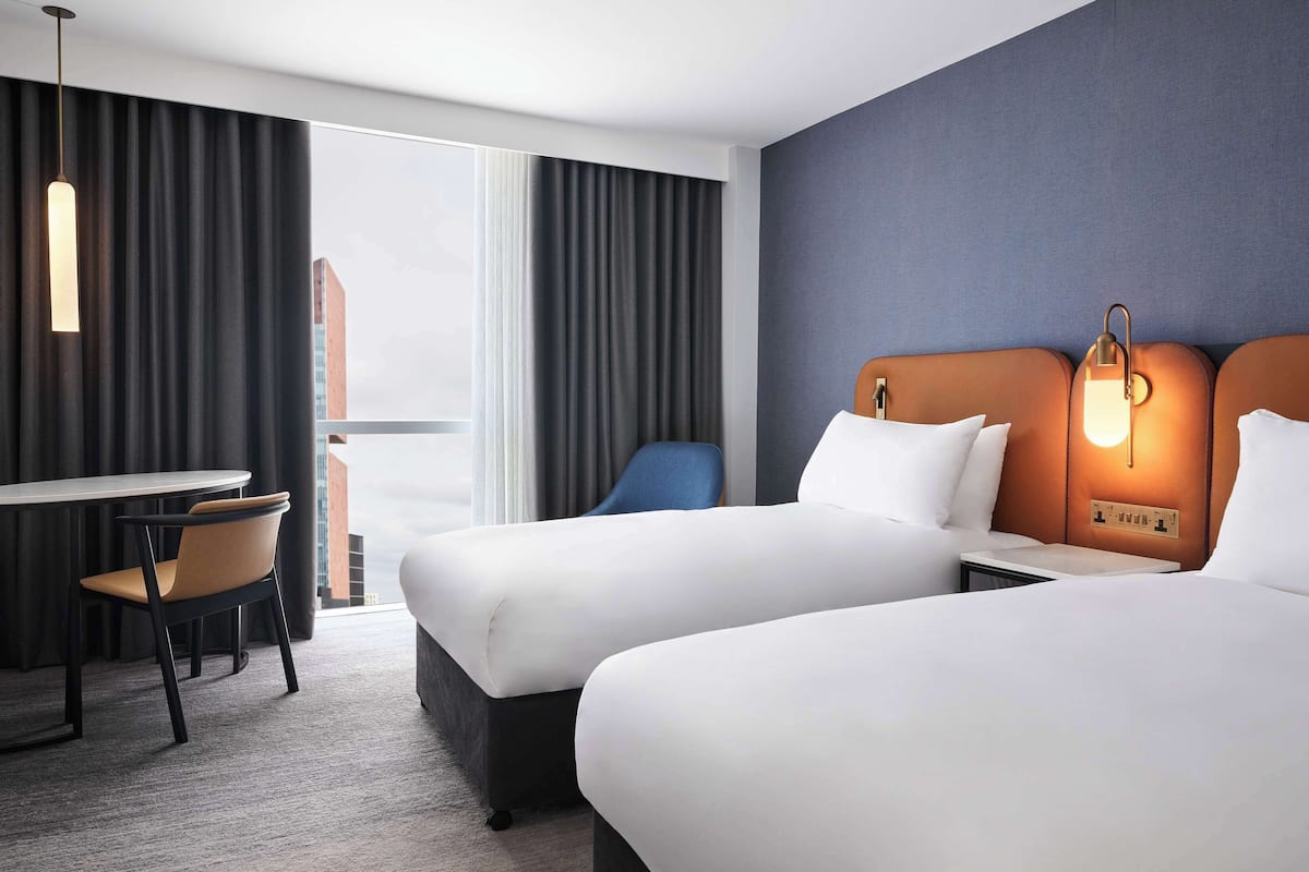 Hypo-allergenic bedding available, in-room safe, desk, laptop workspace