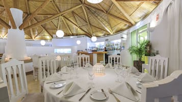 Lunch, dinner served; Mediterranean cuisine, pool views