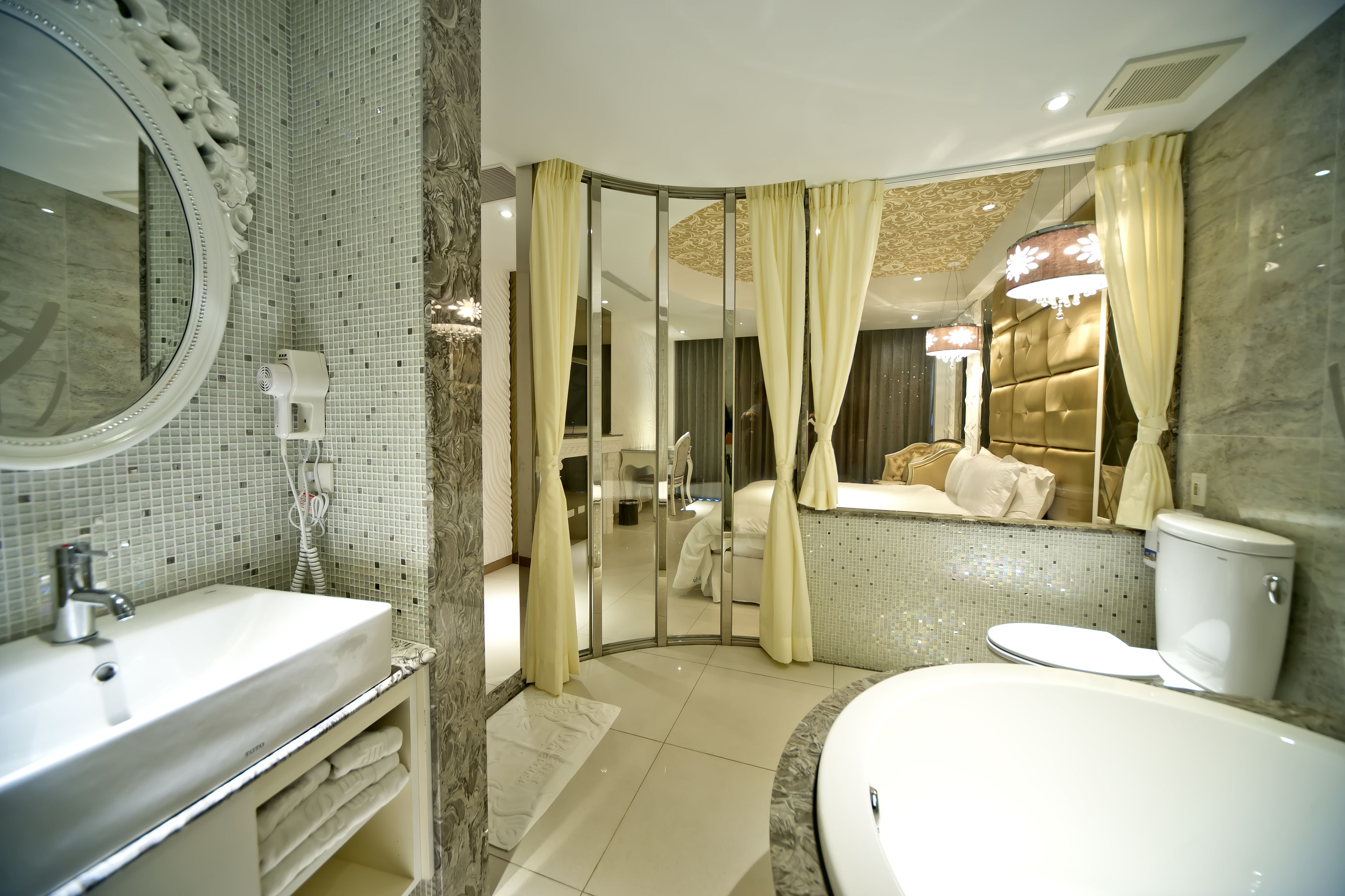 deluxe room, 1 king bed, beach view | bathroom | separate bathtub and shower, hair dryer, slippers, towels