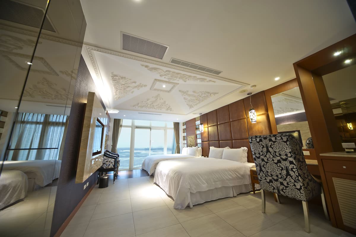 Deluxe Room, Multiple Beds, Beach View | Desk, blackout curtains, rollaway beds, free WiFi